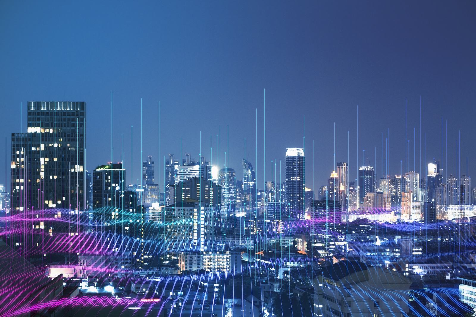 Abstract digital wave on blurry night city backgro