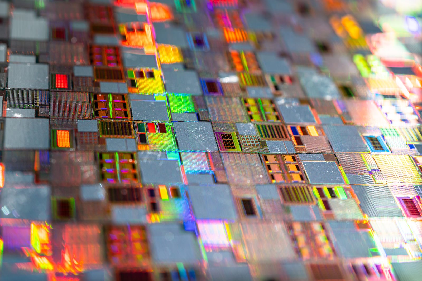 A colorful silicon wafer pattern up close